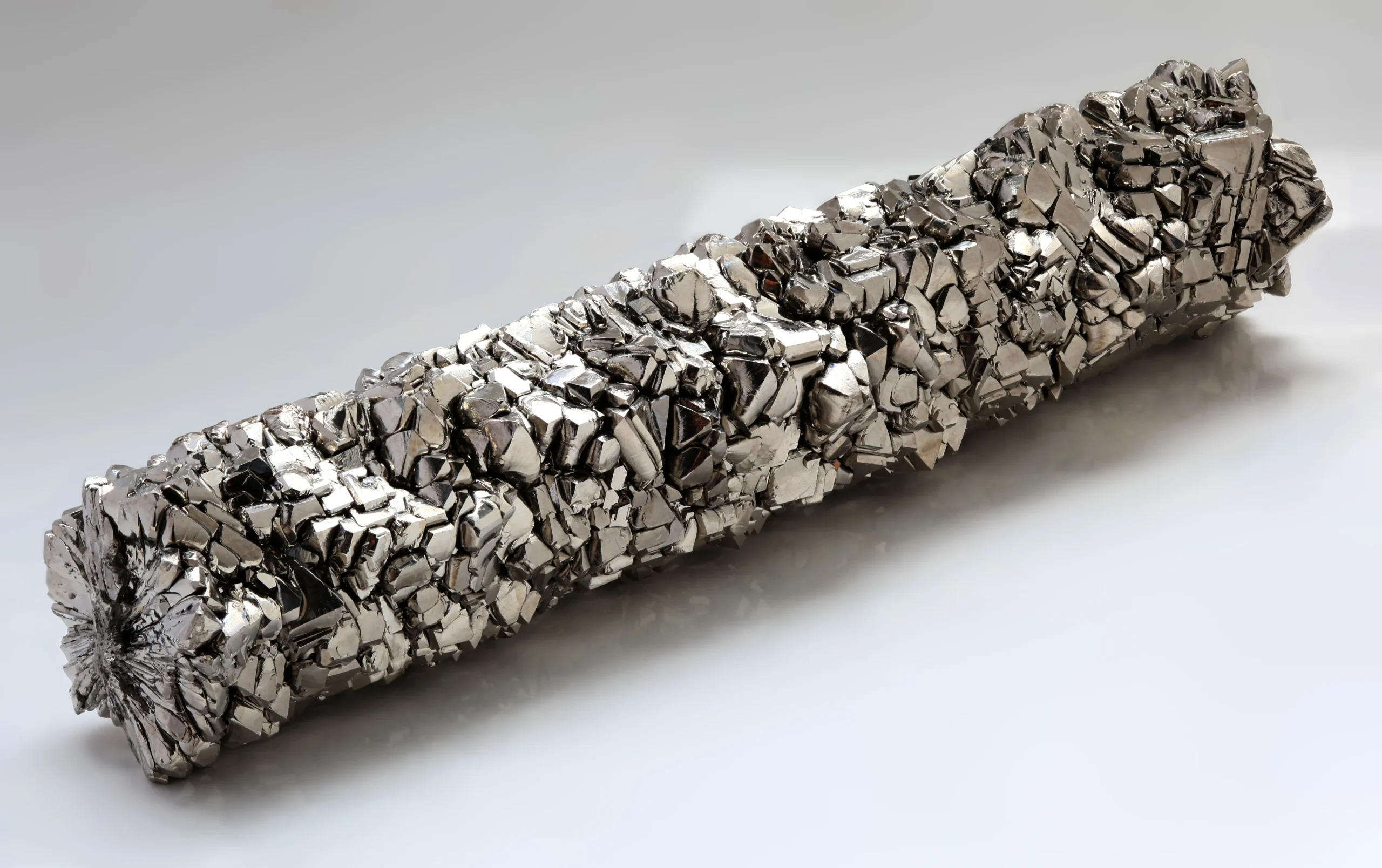 Titanium Thermal Conductivity: Why It's Low and When That Matters 1 Titanium crystal bar - a raw titanium ingot showing the characteristic metallic luster of pure titanium metal