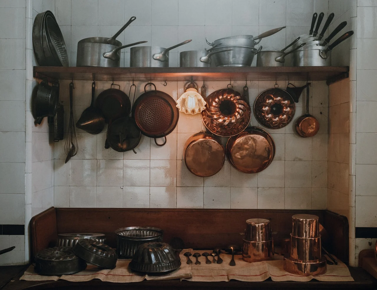 Are Titanium Pans Safe? What I Found After Testing Both Types 3 Collection of different cookware pans and pots showing various materials for comparison
